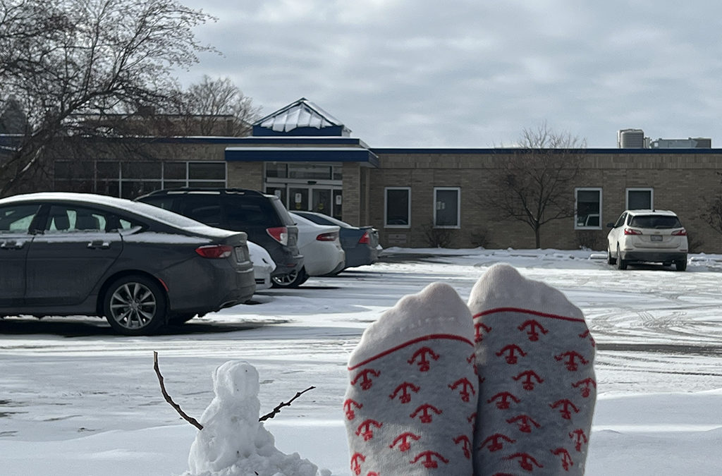 socks and a snowman in front of SLC