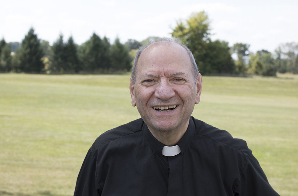 Fr. Joseph Rinaldo outstanding in his field