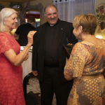 Happy people at Paesano dinner