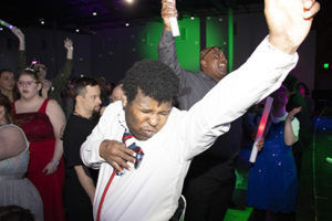 A man with developmental disabilities is dancing