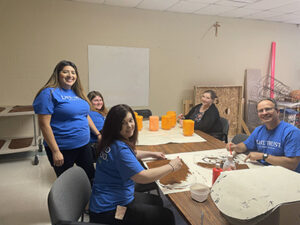 Lake Trust volunteers working on haunted house decorations