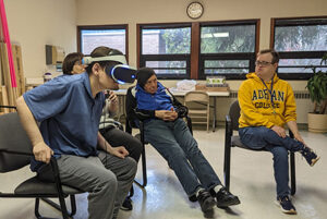 A group of residents playing virtual reality games.