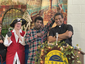 Fr. Satheesh with two residents on the Peter Pan stage