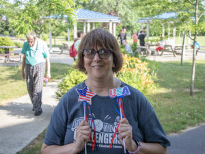 Lee Chambers leads the CHS football team onto the field