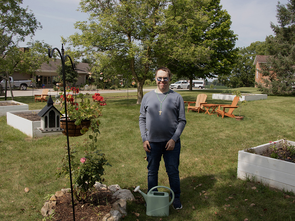 Lee Chambers leads the CHS football team onto the field